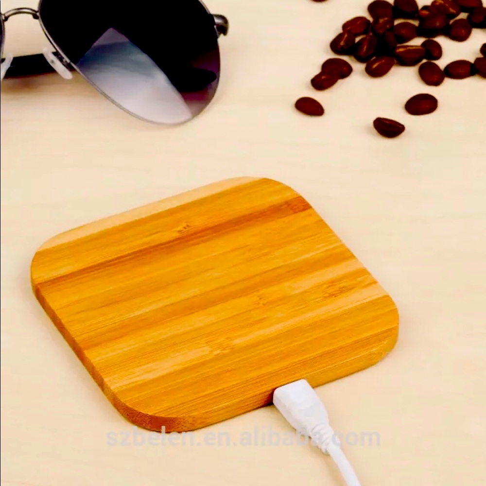 Universal Wireless phone charger. Adapter included